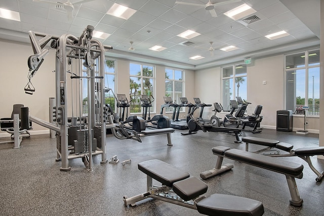 workout area featuring a paneled ceiling