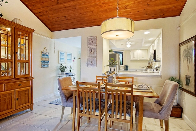 dining space featuring light tile patterned flooring, wooden ceiling, vaulted ceiling, and ceiling fan