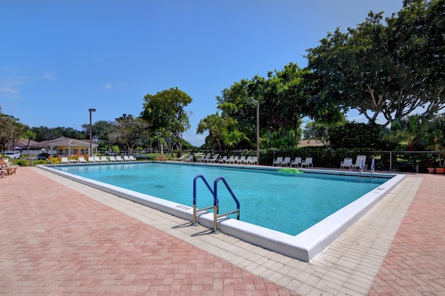 view of swimming pool featuring a patio area