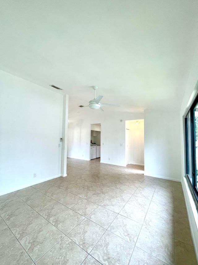 spare room with ceiling fan