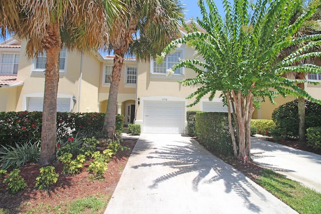 view of front of property with a garage