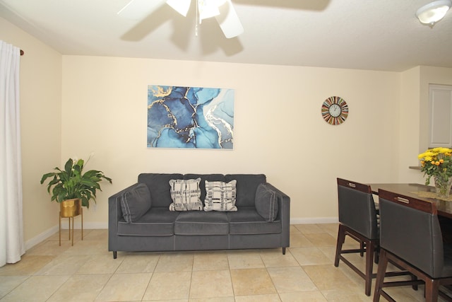 living room featuring ceiling fan and light tile patterned flooring