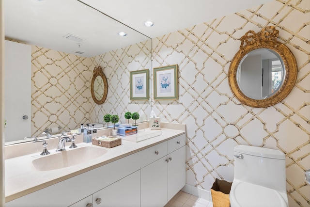 3440 S Ocean Blvd Unit 201N, Palm Beach, FL 33480 - bathroom with recessed lighting, toilet, tile patterned floors, vanity, and wallpapered walls