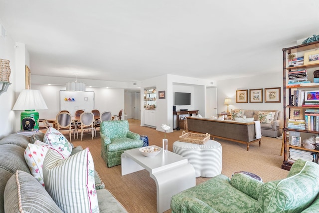 living room featuring light colored carpet