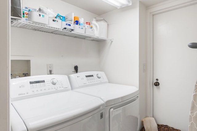 laundry area featuring independent washer and dryer