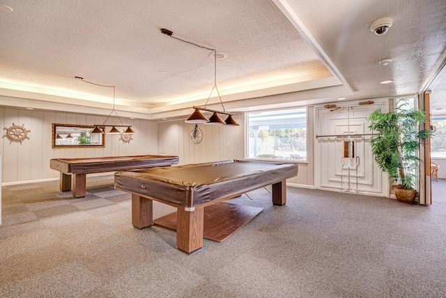 recreation room with billiards, carpet floors, a tray ceiling, and a textured ceiling