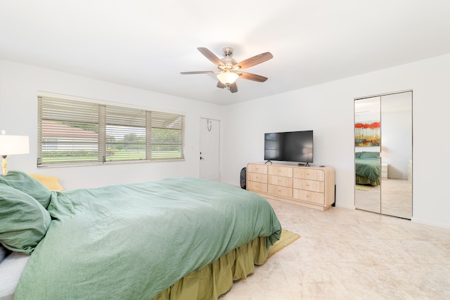 bedroom with a closet and ceiling fan