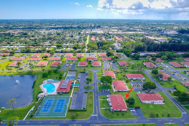 drone / aerial view with a water view