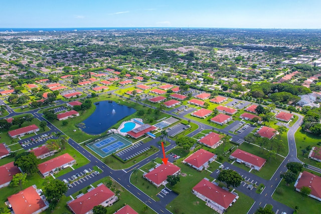 drone / aerial view featuring a water view