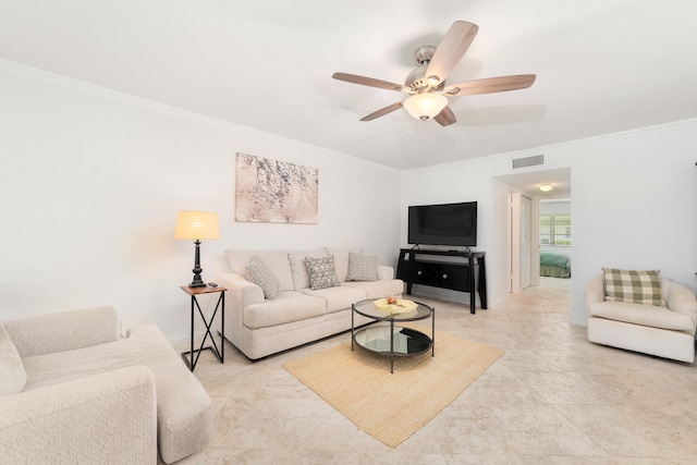 living room featuring crown molding and ceiling fan