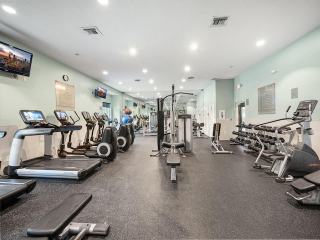 workout area with a textured ceiling