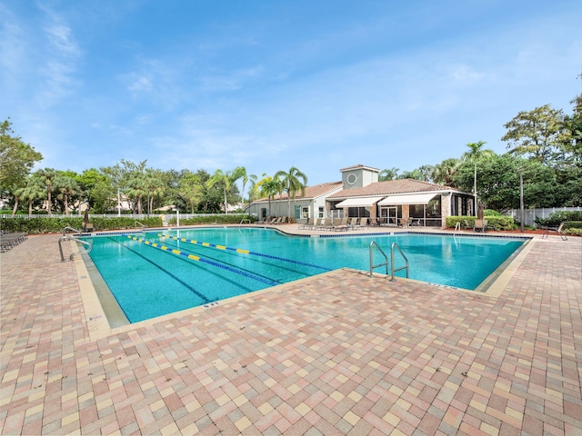 view of pool featuring a patio area