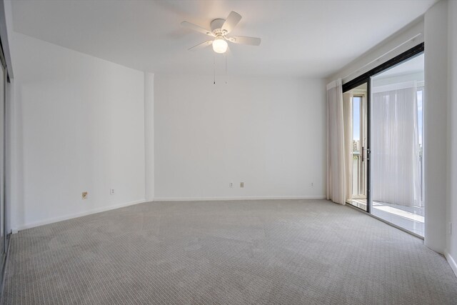 walk in closet featuring carpet flooring