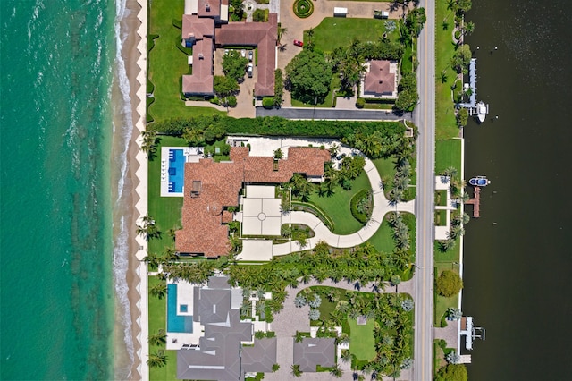 drone / aerial view with a view of the beach and a water view