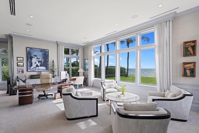 living room featuring crown molding, light carpet, and plenty of natural light