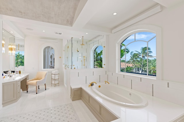 bathroom featuring vanity, tile patterned floors, and separate shower and tub