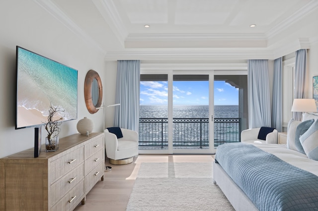 bedroom featuring light hardwood / wood-style floors, access to outside, ornamental molding, and a water view