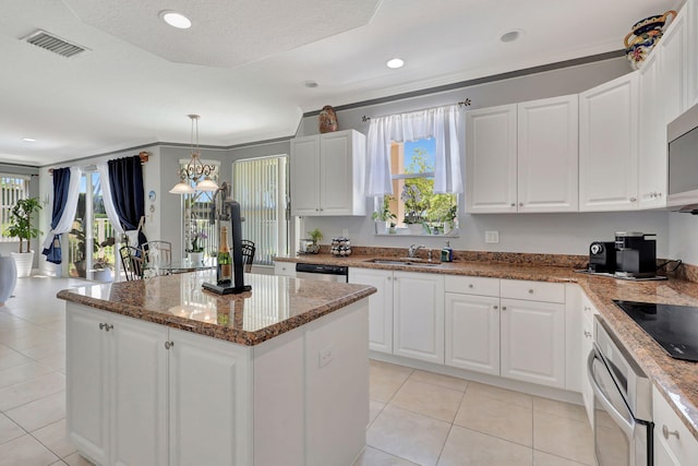 kitchen with white cabinets and stainless steel appliances