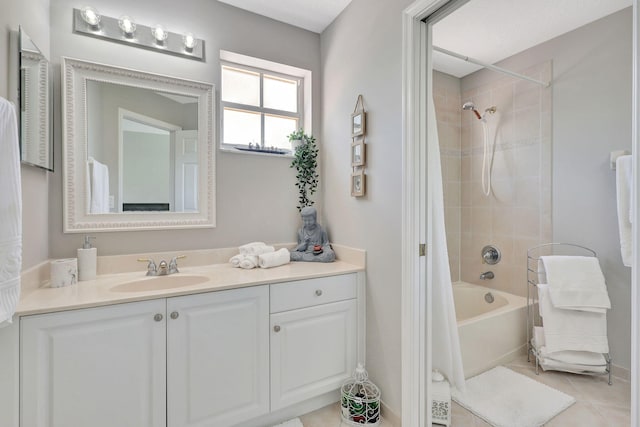 bathroom featuring vanity, shower / bath combo, and tile patterned floors