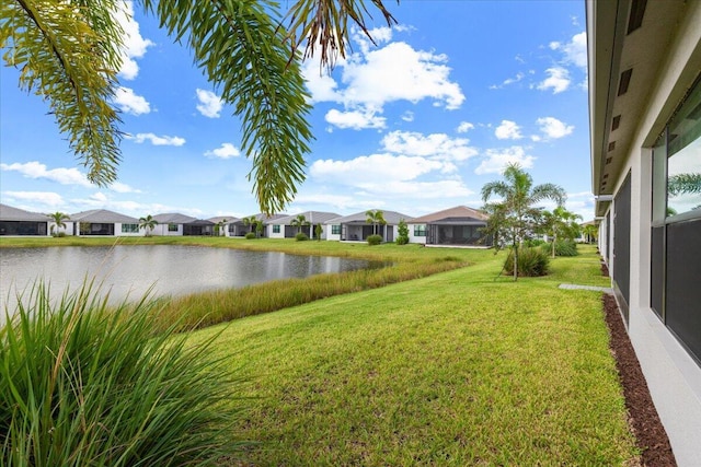 view of yard with a water view