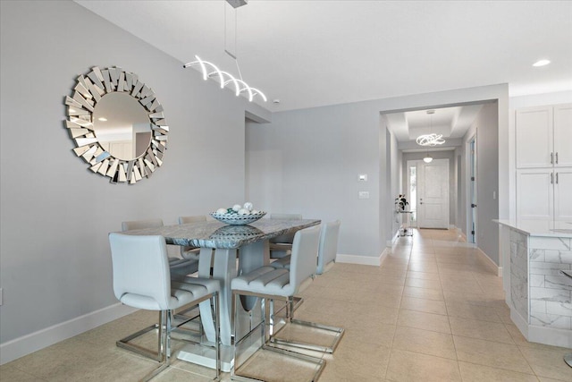 dining space with light tile patterned floors