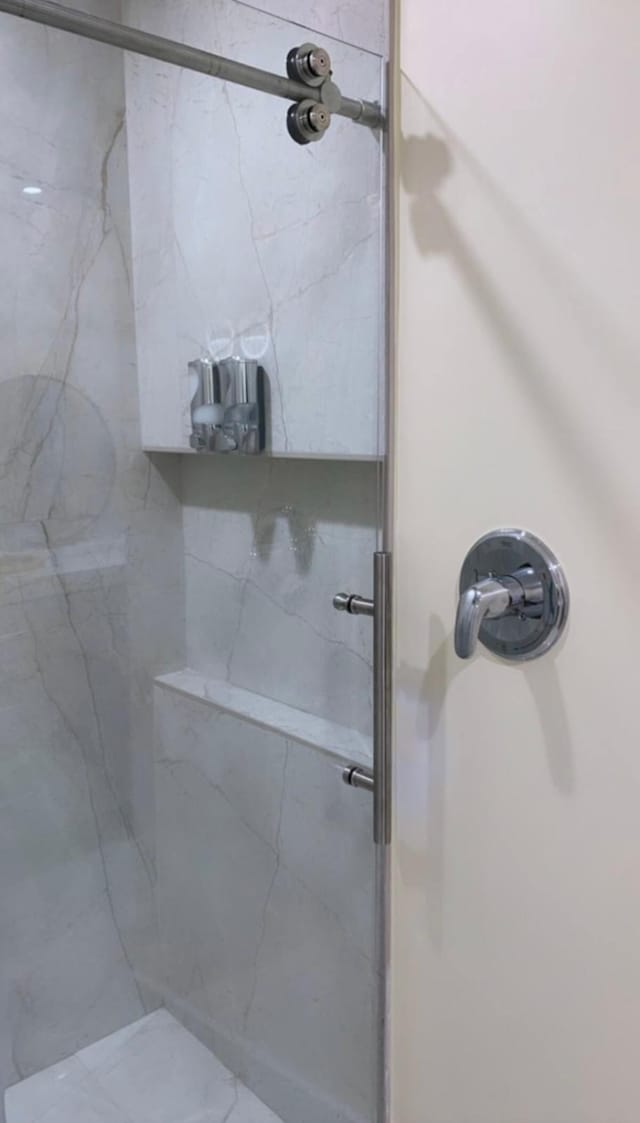 bathroom with walk in shower