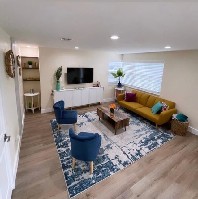 living room with hardwood / wood-style floors