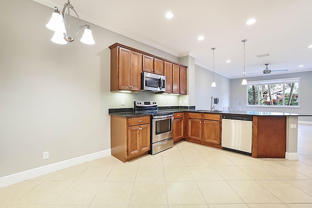 kitchen with dark stone countertops, light tile patterned floors, ornamental molding, and stainless steel refrigerator with ice dispenser