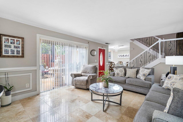 living room featuring crown molding