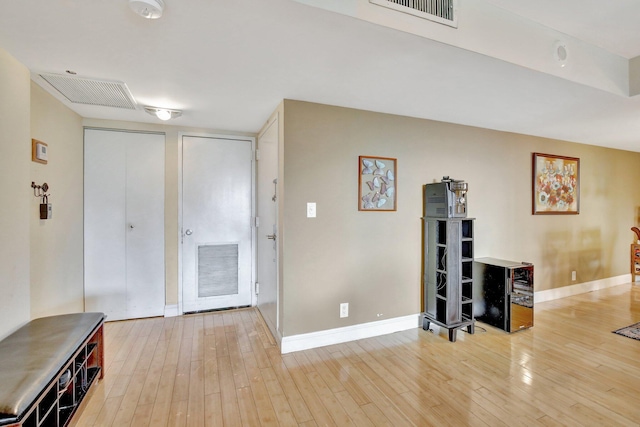 18181 NE 31st Ct Unit 1408, Aventura, FL 33160 - interior space featuring wood-type flooring, visible vents, and baseboards