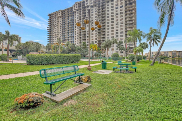 18181 NE 31st Ct Unit 1408, Aventura, FL 33160 - view of property's community with a lawn and fence