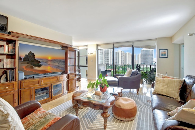 18181 NE 31st Ct Unit 1408, Aventura, FL 33160 - living room featuring expansive windows, a view of city, and light wood-type flooring