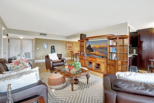 18181 NE 31st Ct Unit 1408, Aventura, FL 33160 - living area with baseboards, visible vents, and light wood-type flooring
