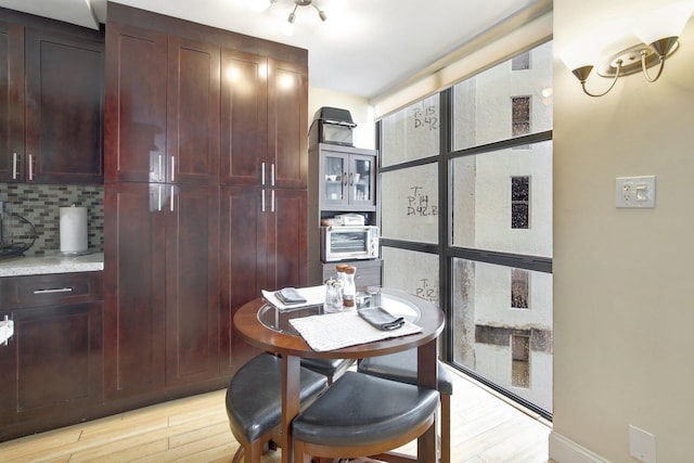 dining room featuring light wood-type flooring