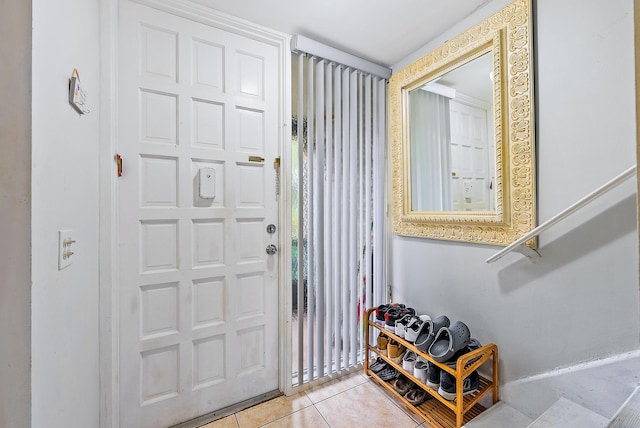 entrance foyer featuring light tile patterned floors