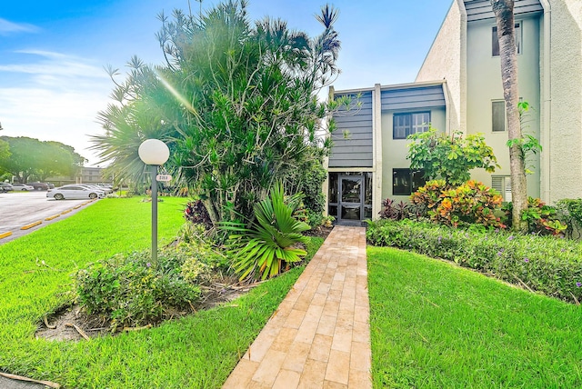 view of front of property with a front lawn