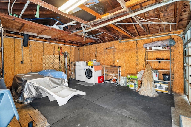 garage with washer and dryer