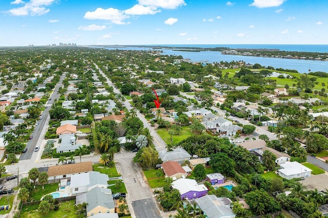 drone / aerial view with a water view