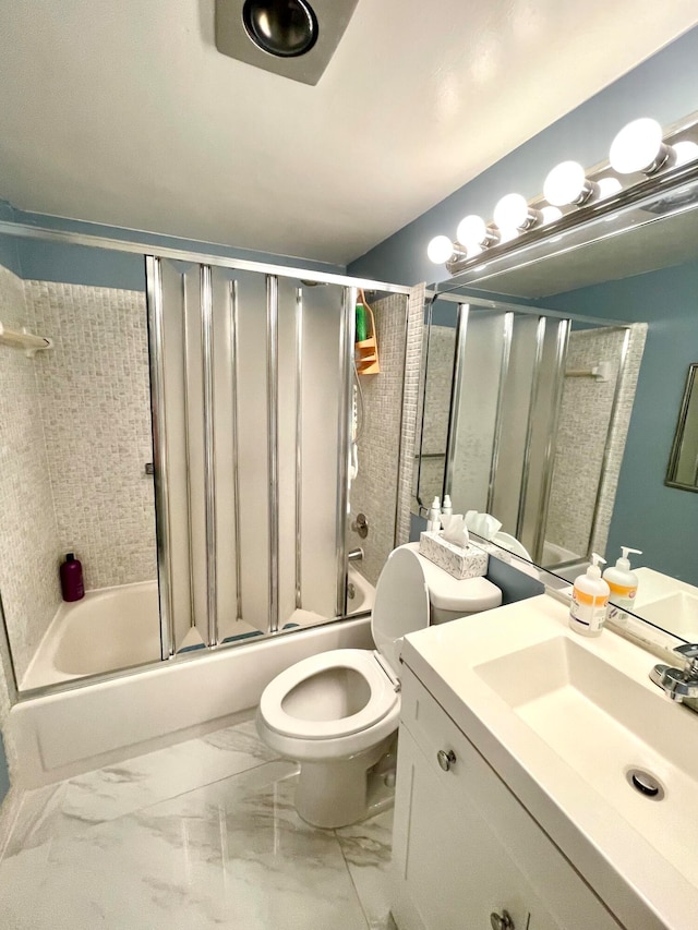 full bathroom with toilet, enclosed tub / shower combo, and vanity