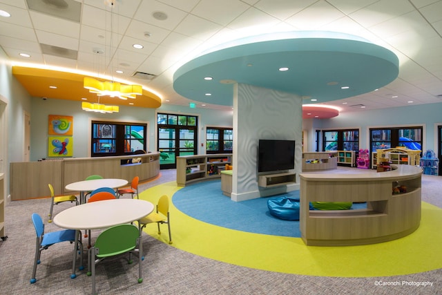 playroom with french doors and carpet flooring