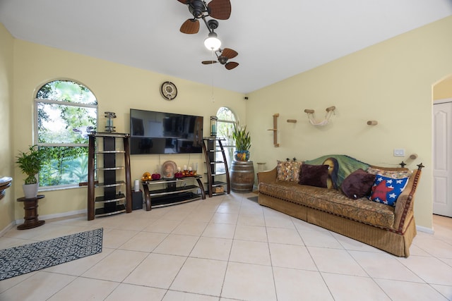 living room featuring ceiling fan and light tile patterned flooring