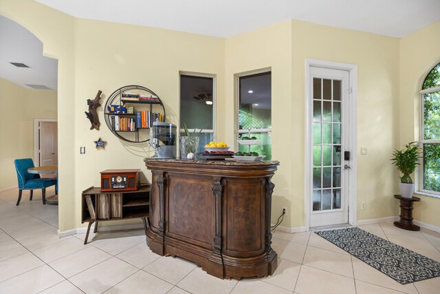 entrance foyer with light tile patterned flooring