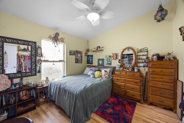 bedroom with ceiling fan and light wood-type flooring