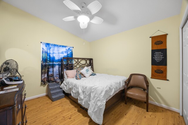 bedroom featuring ceiling fan and light hardwood / wood-style flooring