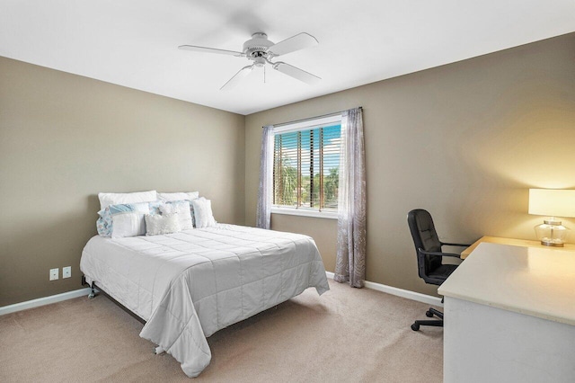 bedroom with ceiling fan and light colored carpet