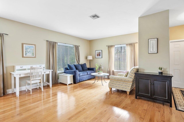 living room featuring light wood-type flooring