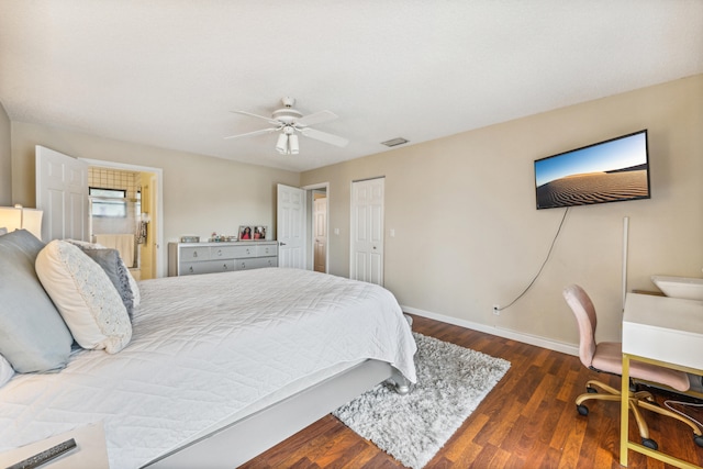 bedroom featuring ceiling fan, a closet, and dark hardwood / wood-style flooring