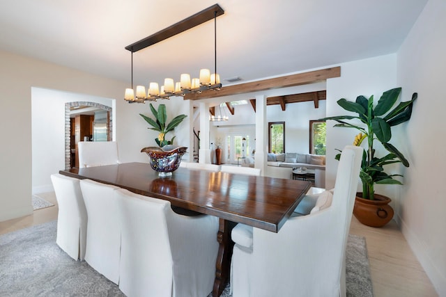 dining room featuring a notable chandelier