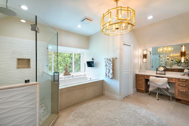 bathroom with hardwood / wood-style floors, a chandelier, vanity, and plus walk in shower