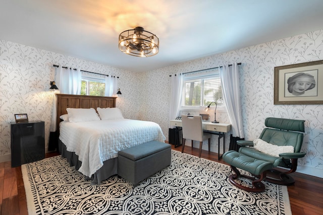 bedroom with hardwood / wood-style floors